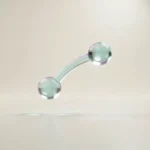 Holografisches Glas-Icon: zwei Punkte mit sanfter Verbindungslinie als Symbol für Zugehörigkeit (mint/teal, soft glow).